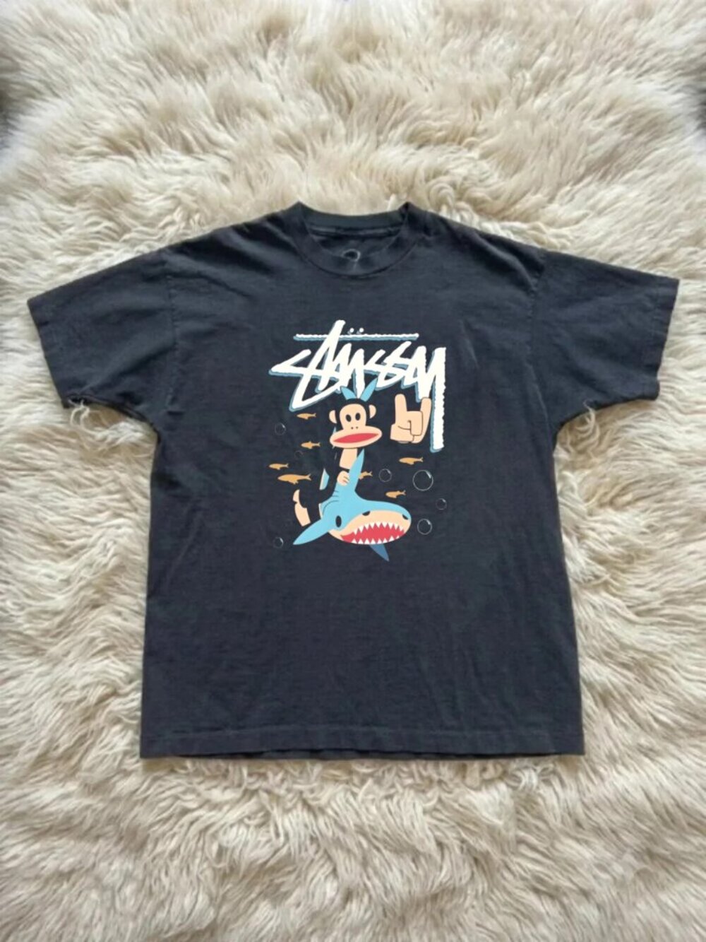 Stussy T-Shirt Featuring a Screen-Printed Graphic of a Cartoon Shark Under